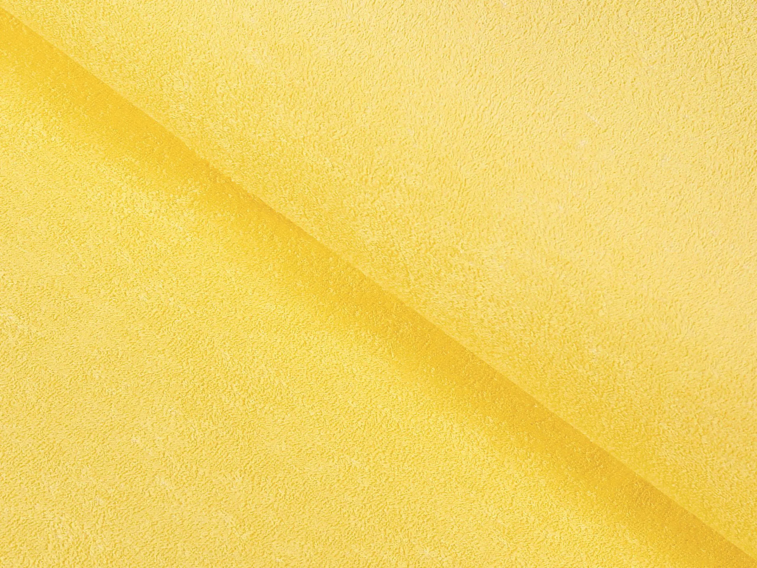 Nepropustné Froté metráž světle žlutá značky Škodák.