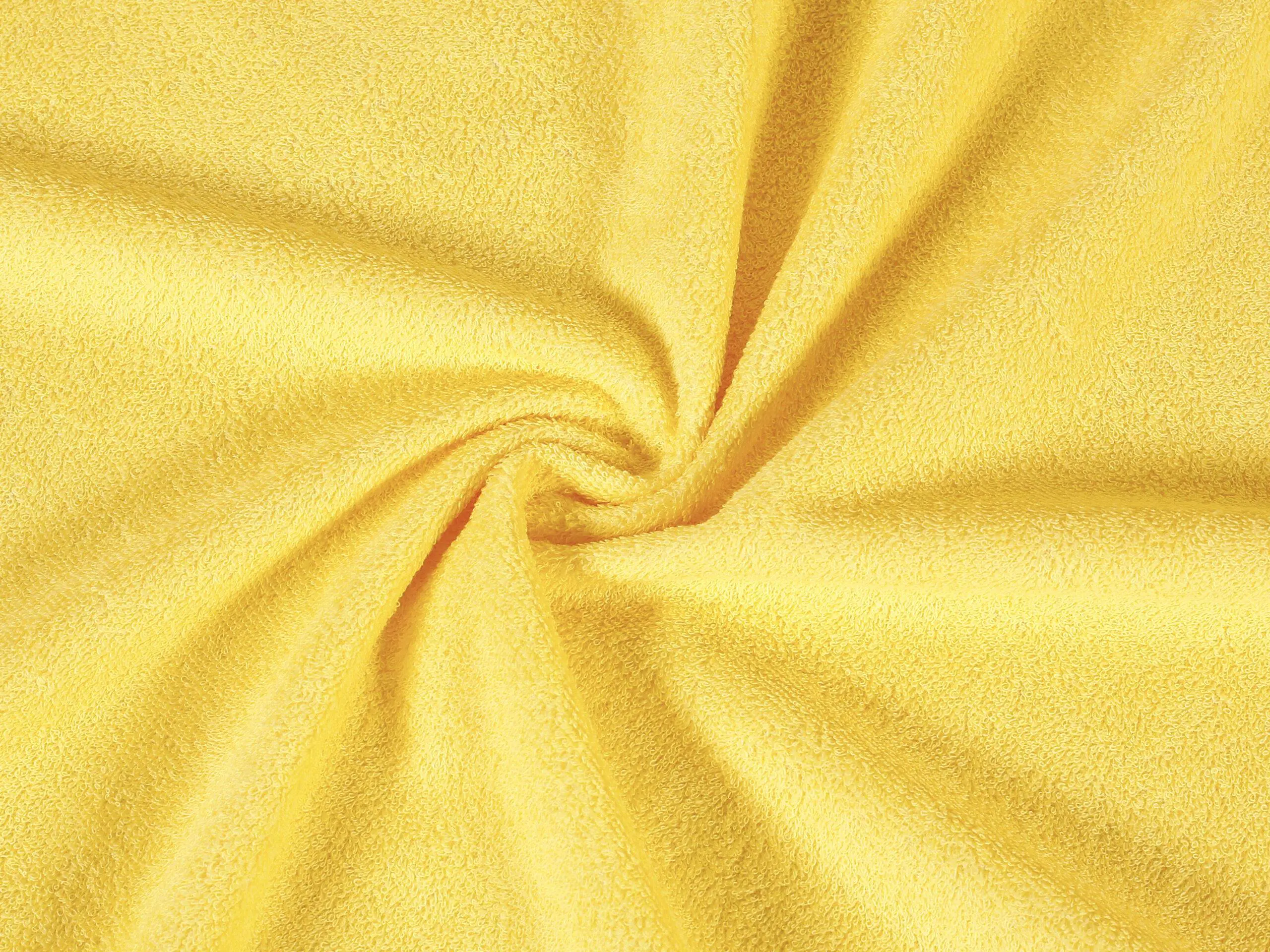 Nepropustné Froté metráž světle žlutá značky Škodák.