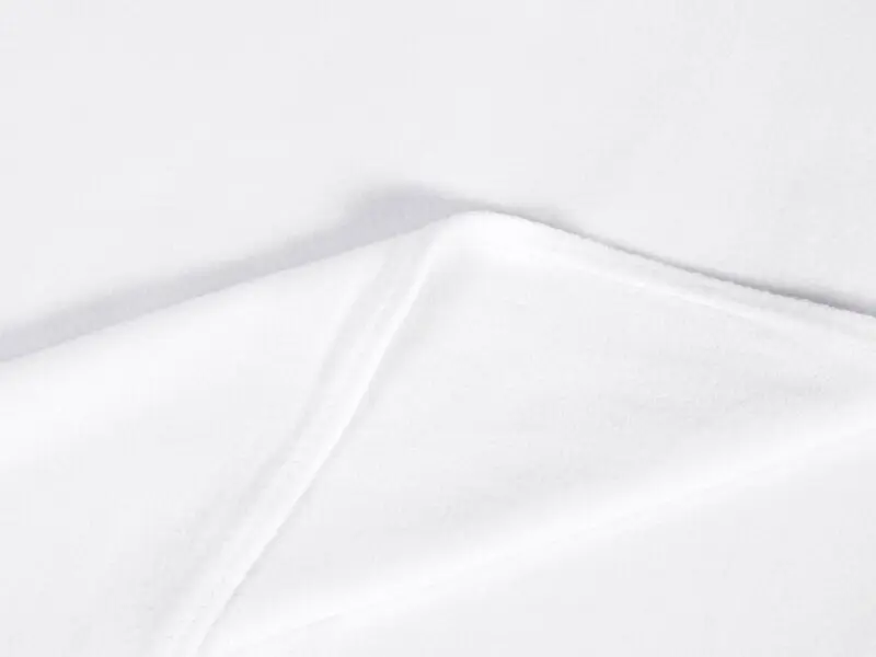 Polar Fleece bílá metráž značky Škodák.