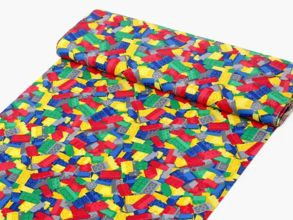 Bavlněná látka barevné lego metráž značky Škodák.