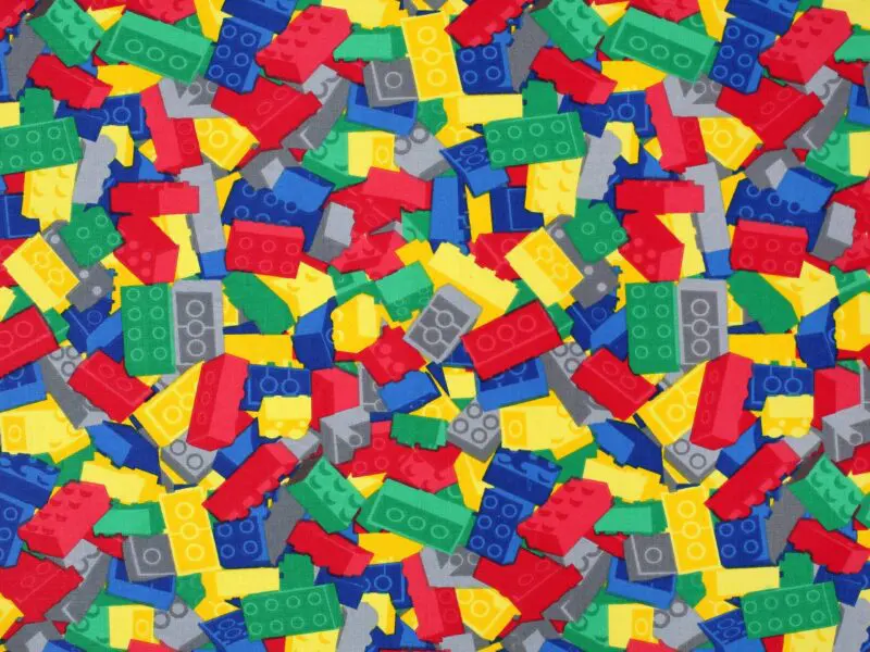 Bavlněná látka barevné lego metráž značky Škodák.