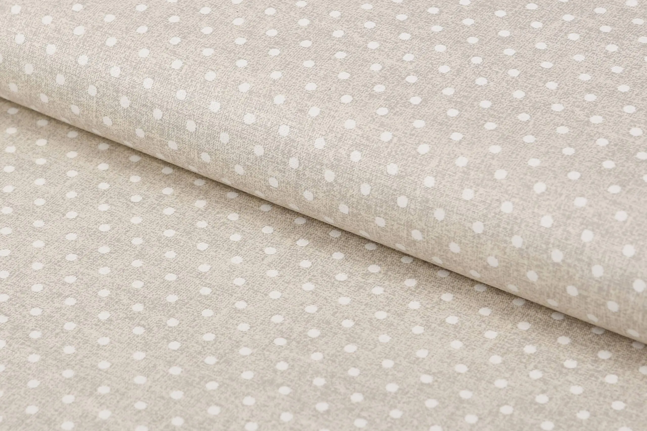 Bavlněná látka bílé puntíky na režné metráž značky Škodák.