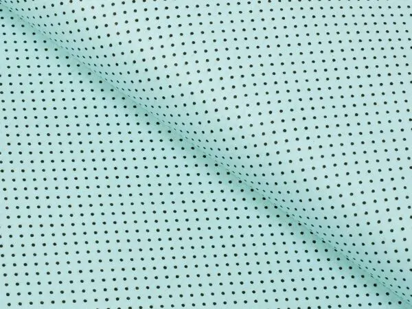 Bavlněná látka šedé puntíky na mintové metráž značky Škodák.