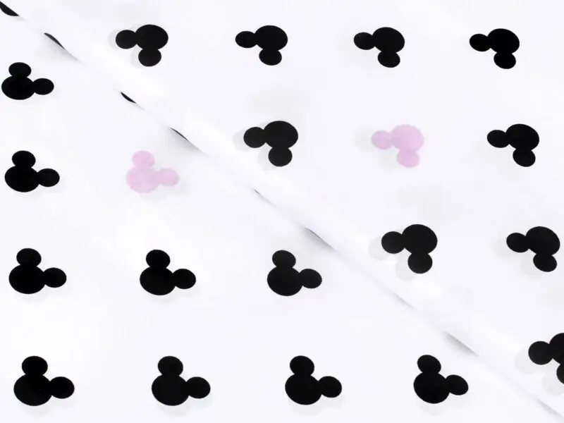 Bavlněná látka mickey mouse na světle růžové metráž značky Škodák.
