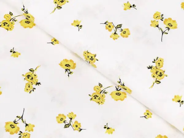 Bavlněná látka žluté květy na bílé metráž značky Škodák.