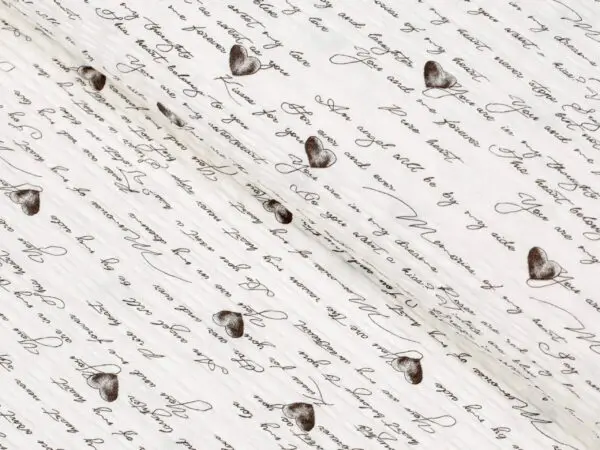 Krepová látka heart writing metráž značky Škodák.