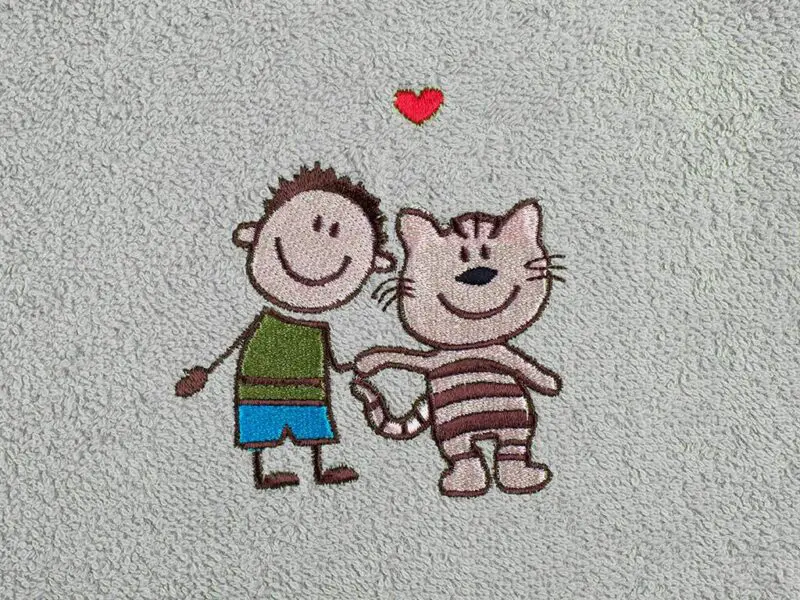 Tmavě šedý dětský froté ručník značky Škodák.
