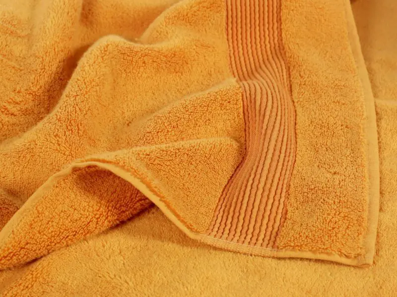 Froté ručník / osuška micro exklusiv oranžová značky Škodák.