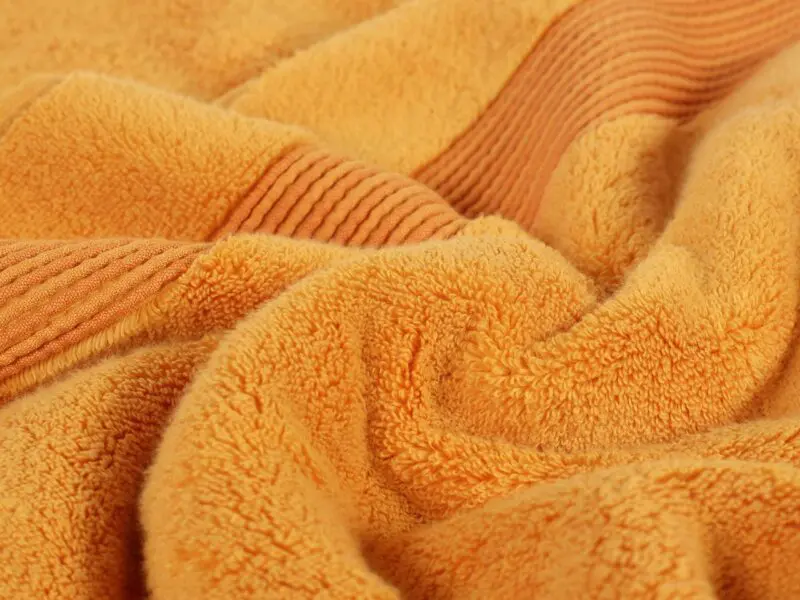 Froté ručník / osuška micro exklusiv oranžová značky Škodák.