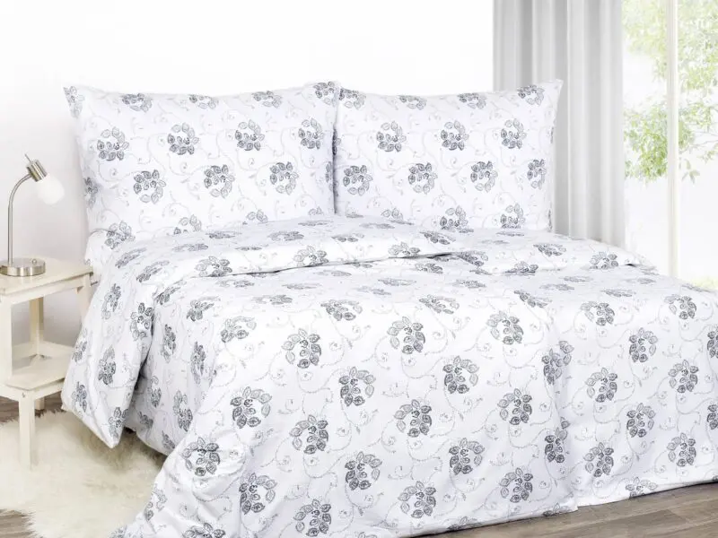 Flanelové povlečení modré ornamenty na bílé značky Škodák.