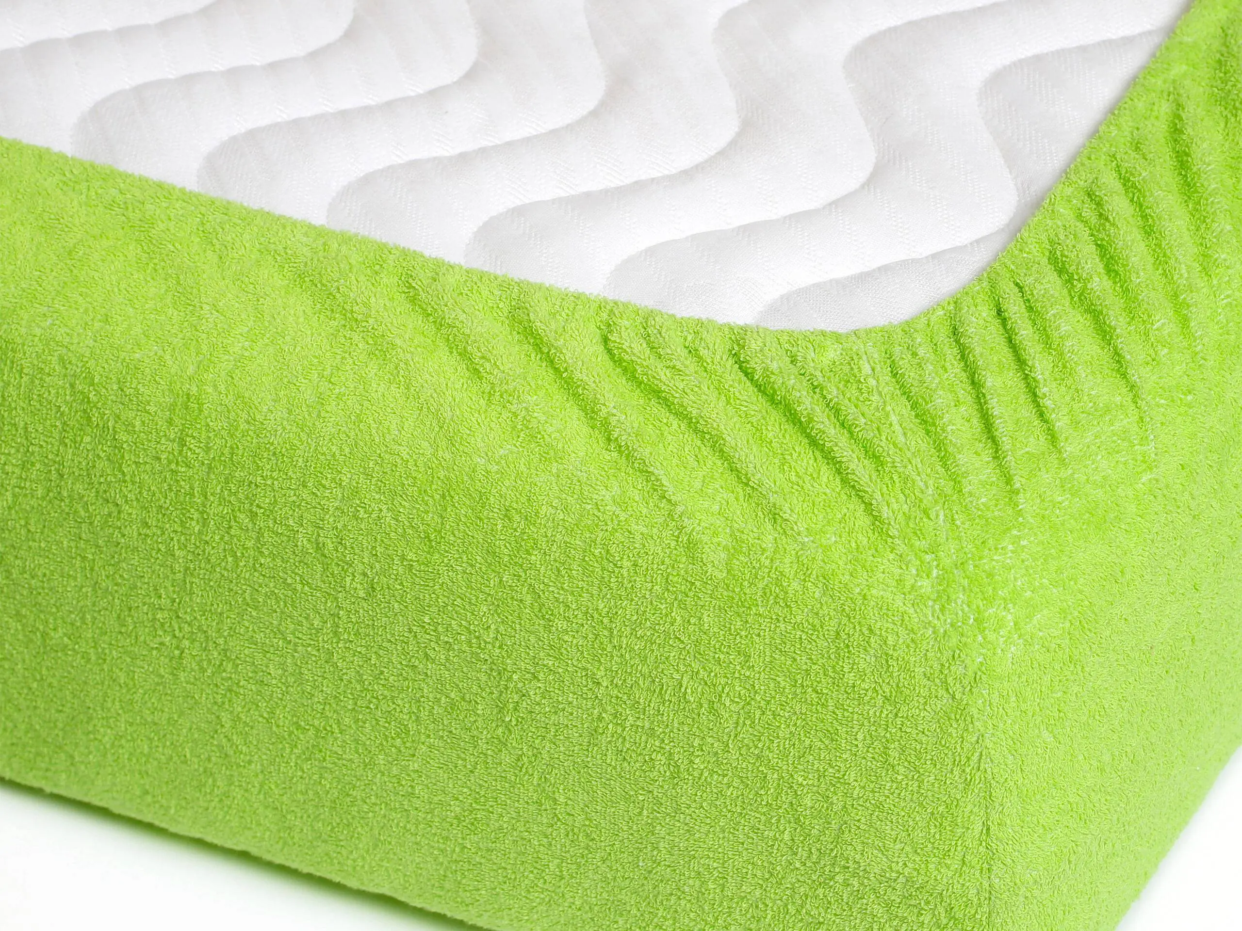 Nepropustné froté prostěradlo s napínací gumou zelené značky Škodák.