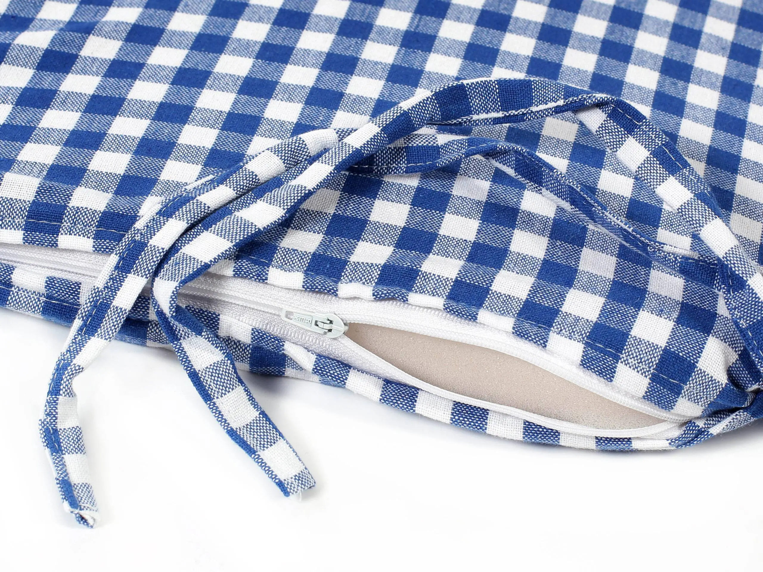 Podsedák kanafas s lemem modrá malá kostka značky Škodák.