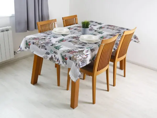 Vánoční ubrus Loneta zasněžená vesnička značky Škodák