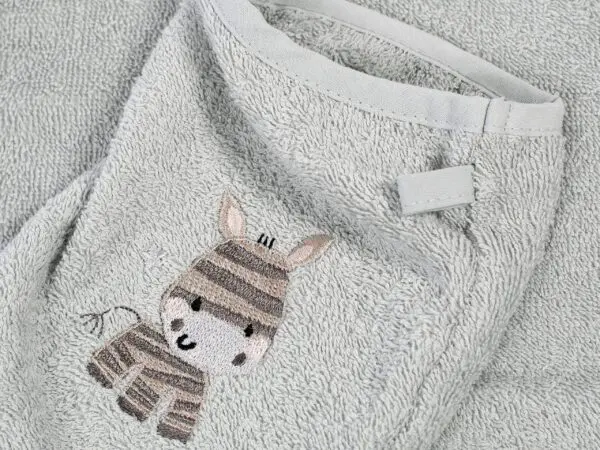 Dětská froté žínka LILI šedá zebra značky Škodák