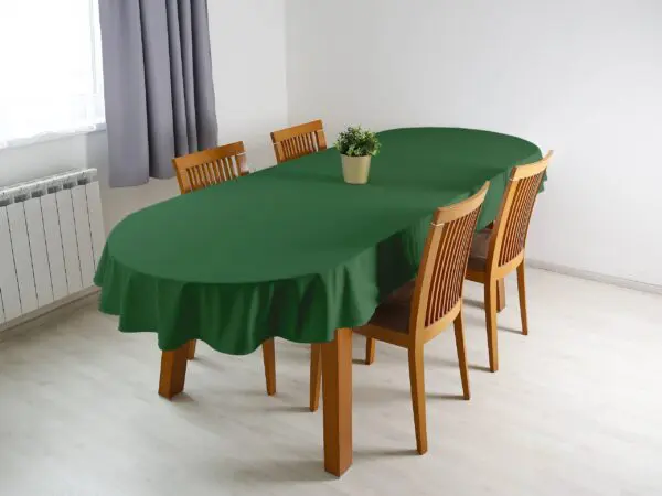Oválný ubrus Loneta tmavě zelený značky Škodák.