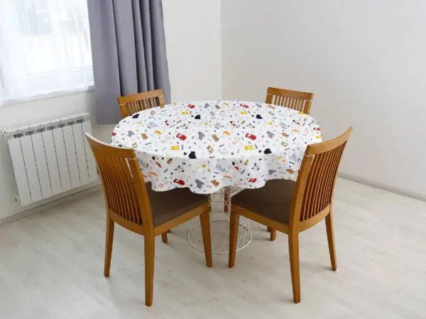 Kulatý bavlněný ubrus pejsci na bílé značky Škodák.