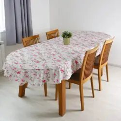 Oválný ubrus Loneta růžové popínavé květinky značky Škodák.