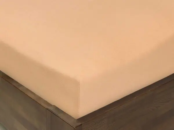 Napínací prostěradlo jersey lososové do školky značky Škodák.