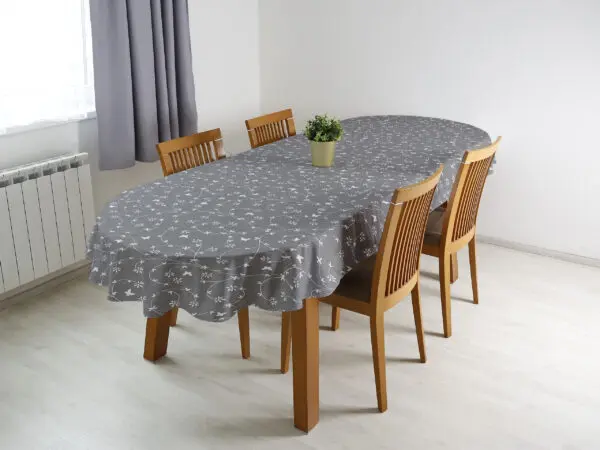 Oválný bavlněný ubrus bílé kytičky na šedé značky Škodák