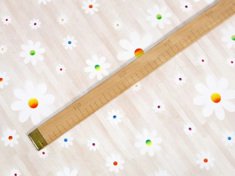 PVC ubrus kopretiny na béžové do školky 140 cm role 20 m značky Škodák.