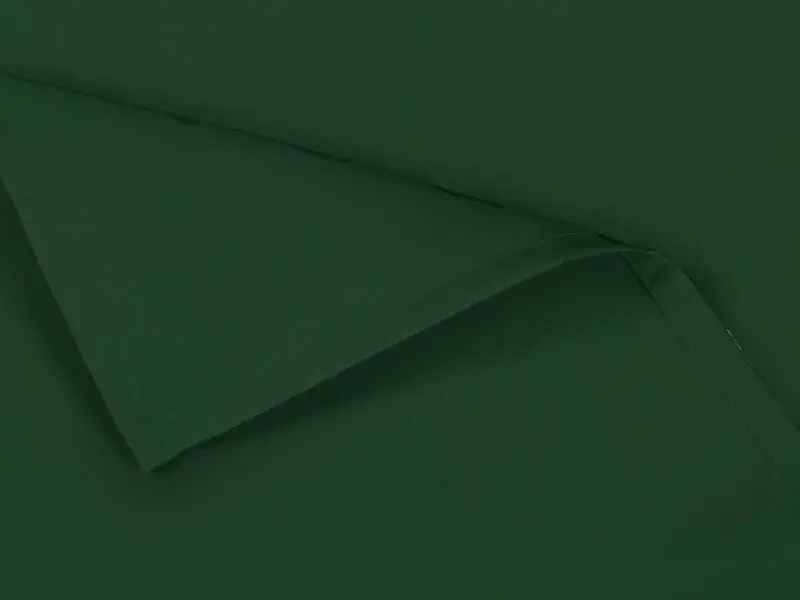 Bavlněné prostírání tmavě zelené značky Škodák.