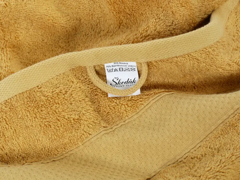Bambusový ručník / osuška Baroko - zlatá značky Škodák.