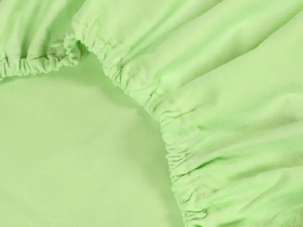 Jersey prostěradlo s napínací gumou světle zelené značky Škodák