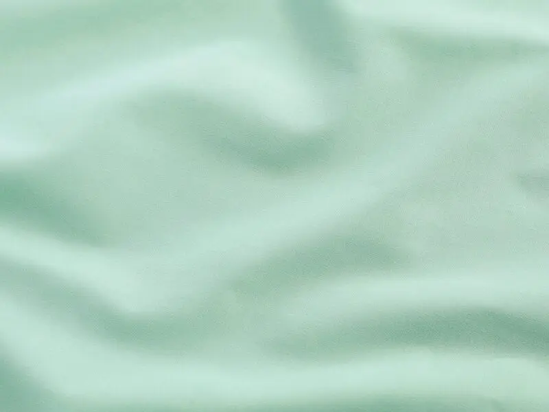 Bavlněná látka plátno SUZY světle mintová značky ŠKODÁK.