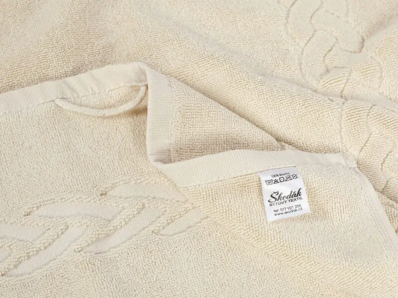 Koupelnová froté předložka natural/ ecru vzor vánočka značky Škodák