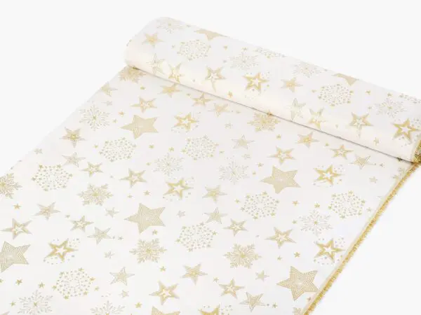 Dekorační látka zlaté hvězdy na krémové metráž šířka 160 cm značky Škodák.