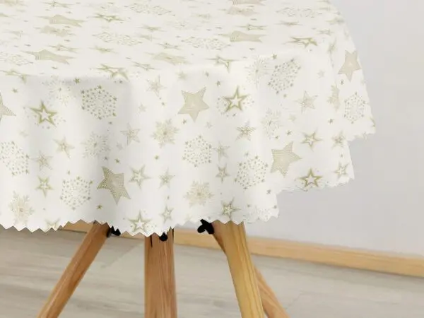 Kulatý dekorační ubrus zlaté hvězdy na krémové značky Škodák.