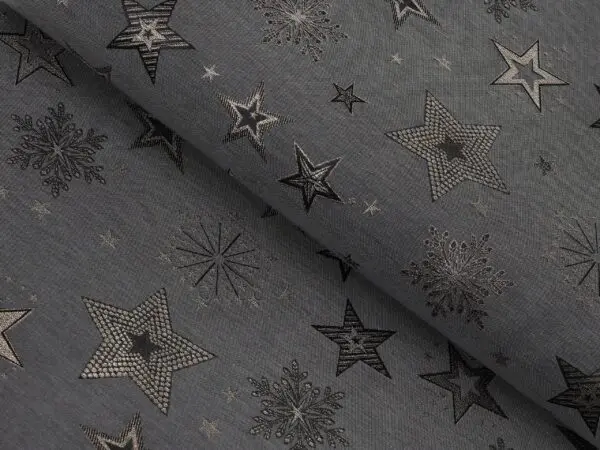 Dekorační látka stříbrné hvězdy na šedé metráž šířka 160 cm značky Škodák.