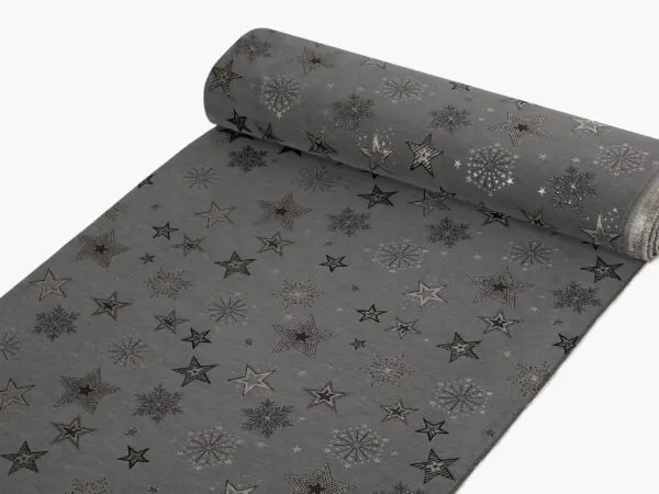 Dekorační látka stříbrné hvězdy na šedé metráž šířka 160 cm značky Škodák.