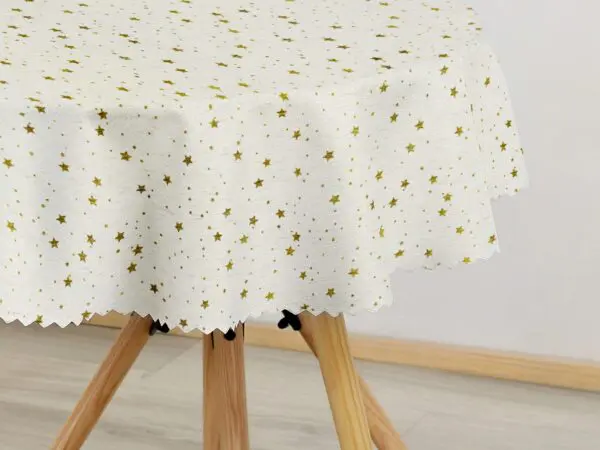 Kulatý dekorační ubrus zlaté hvězdy na režné značky Škodák.