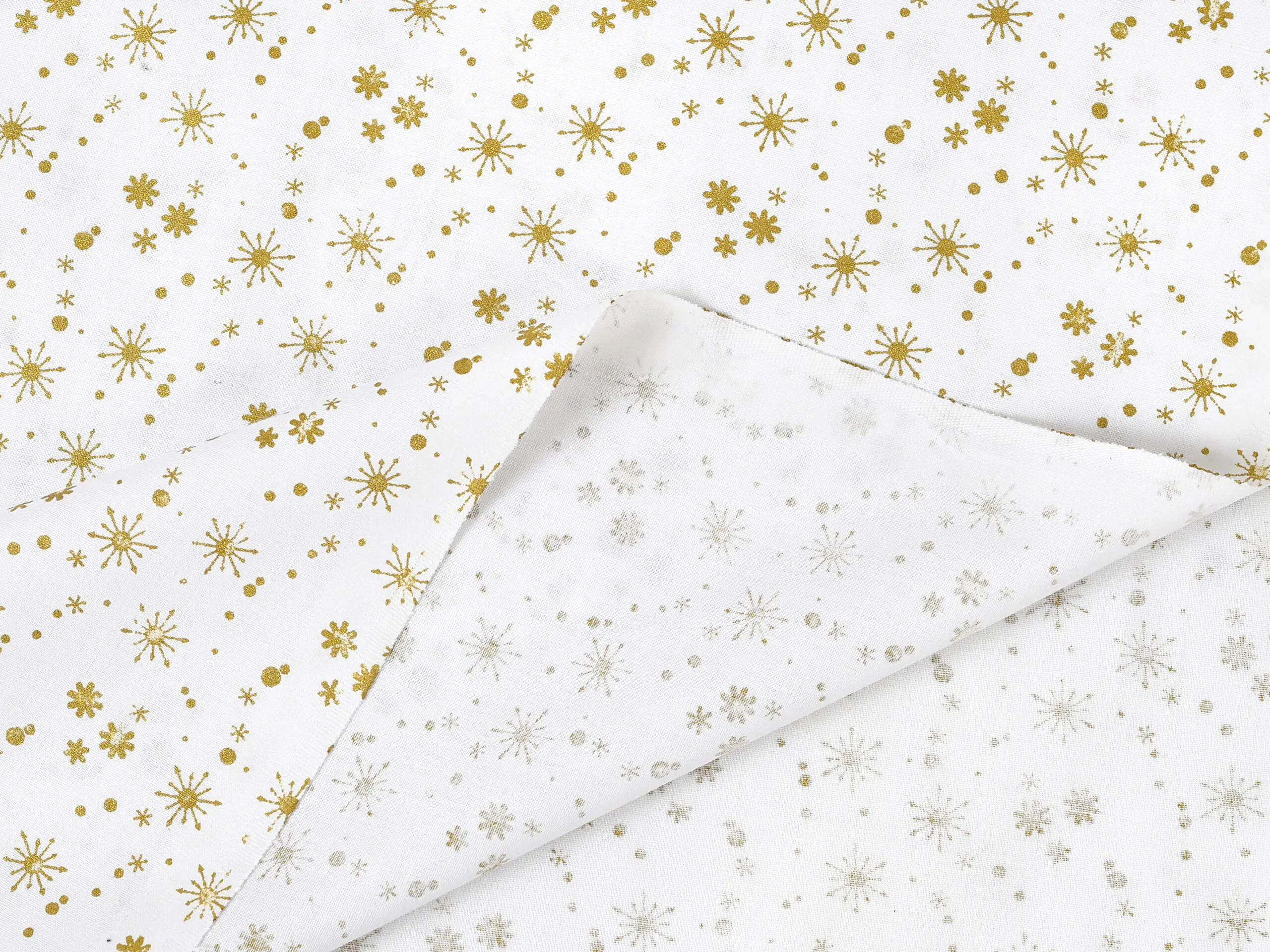Bavlněná látka zlaté vločky na bílé metráž šířka 142 cm značky Škodák.