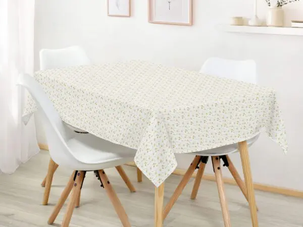 Hranatý bavlněný ubrus zlaté vločky na bílé značky Škodák.