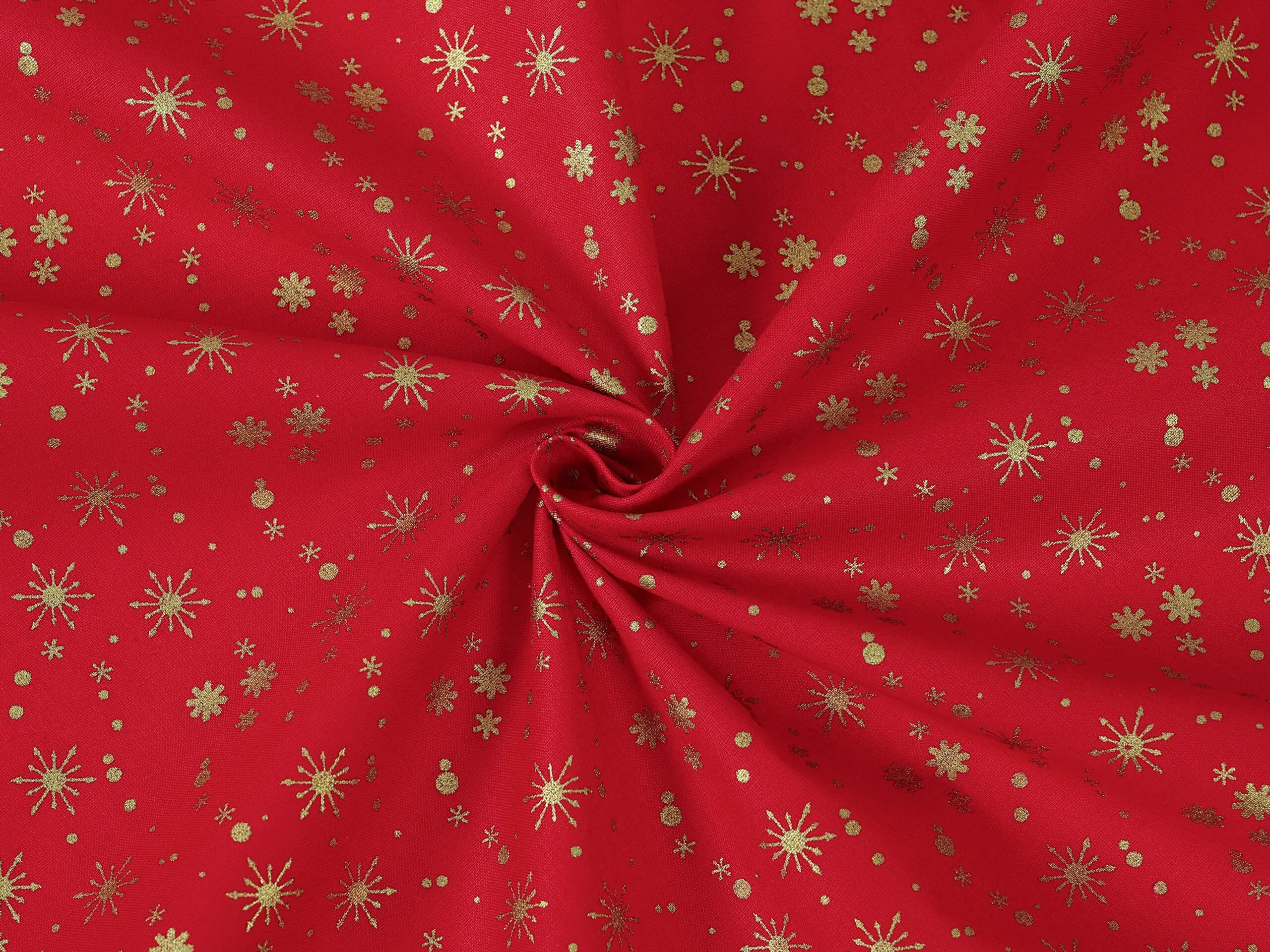 Bavlněná látka zlaté vločky na červené metráž šířka 142 cm značky Škodák.