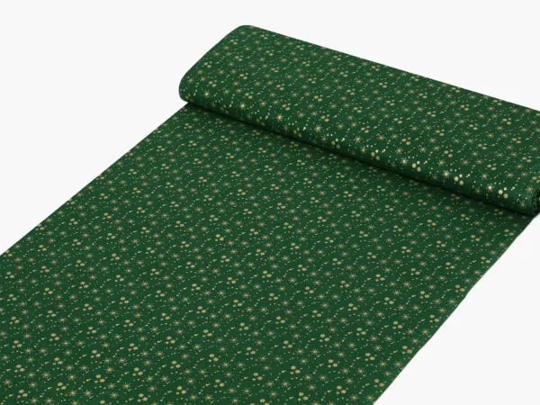 Bavlněná látka zlaté vločky na zelené metráž šířka 142 cm značky Škodák.