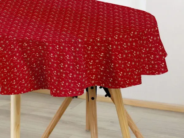 Oválný bavlněný ubrus zlaté vločky na červené