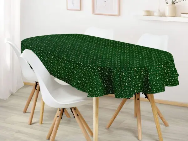 Oválný bavlněný ubrus zlaté vločky na zelené