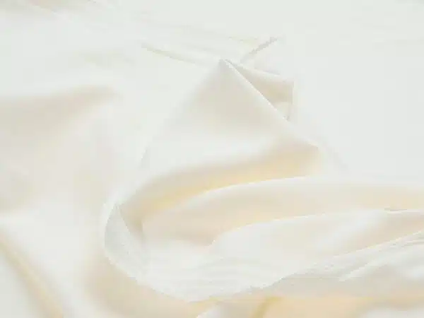 Dekorační látka rongo smetanová metráž značky Škodák.