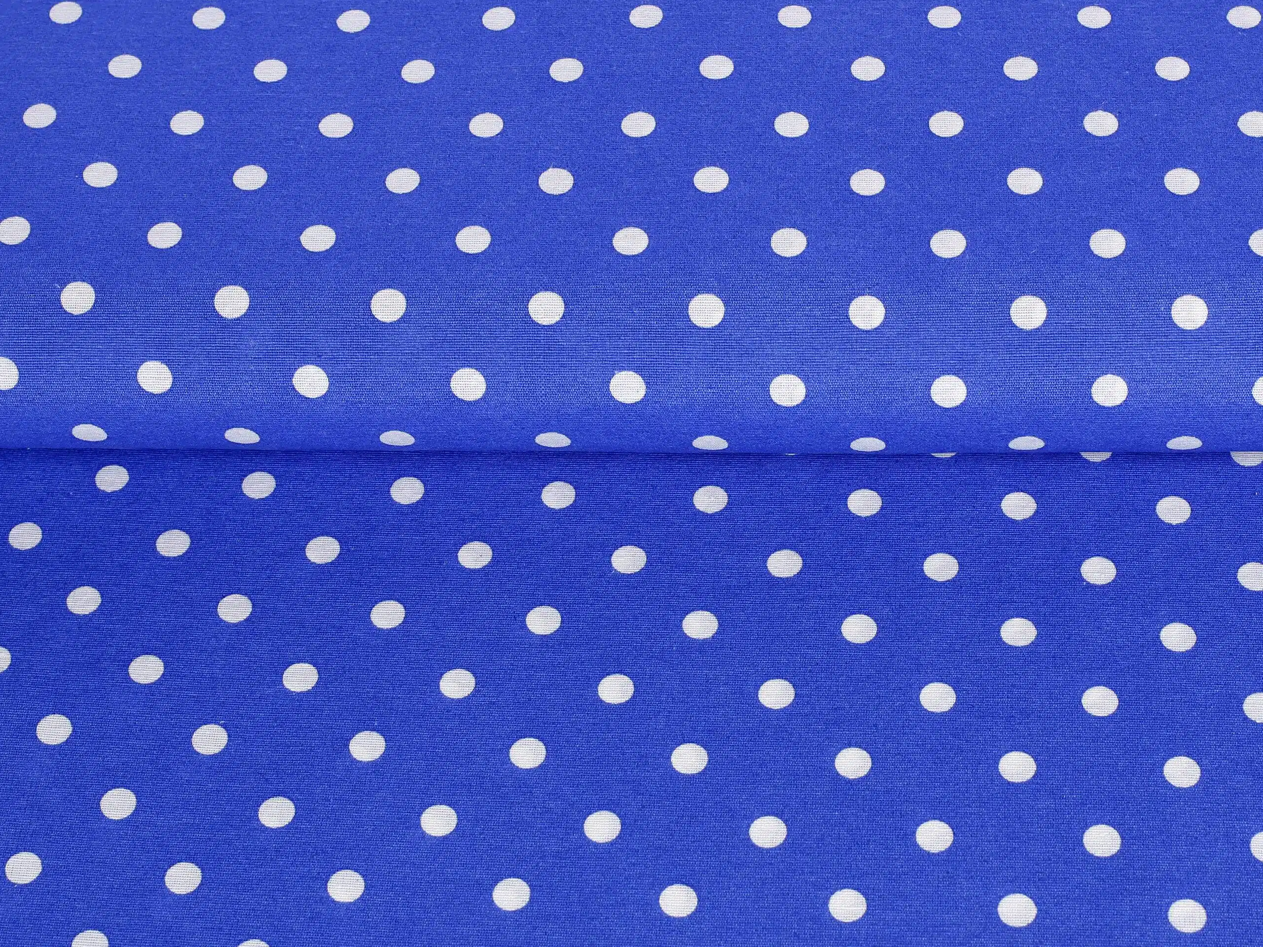 LONETA se vzorem puntíky na modré metráž Škodák