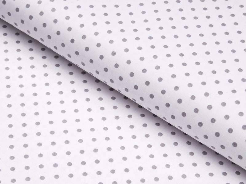 Bavlněná látka šedé puntíky na bílé metráž značky Škodák.