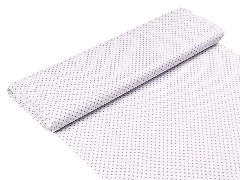 Bavlněná látka šedé puntíky na bílé metráž značky Škodák.