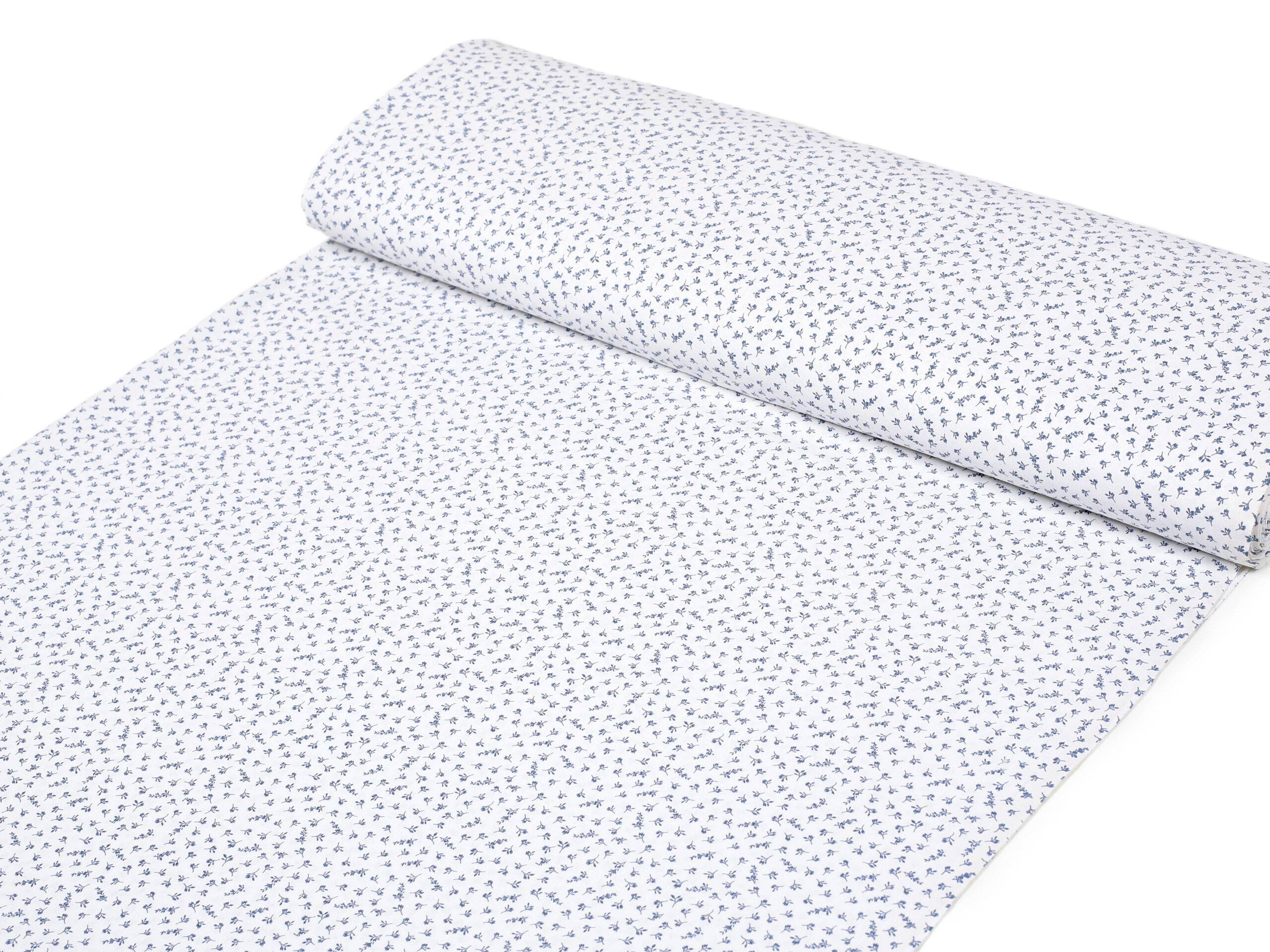 Bavlněná látka modré kvítí na bílém metráž značky Škodák.