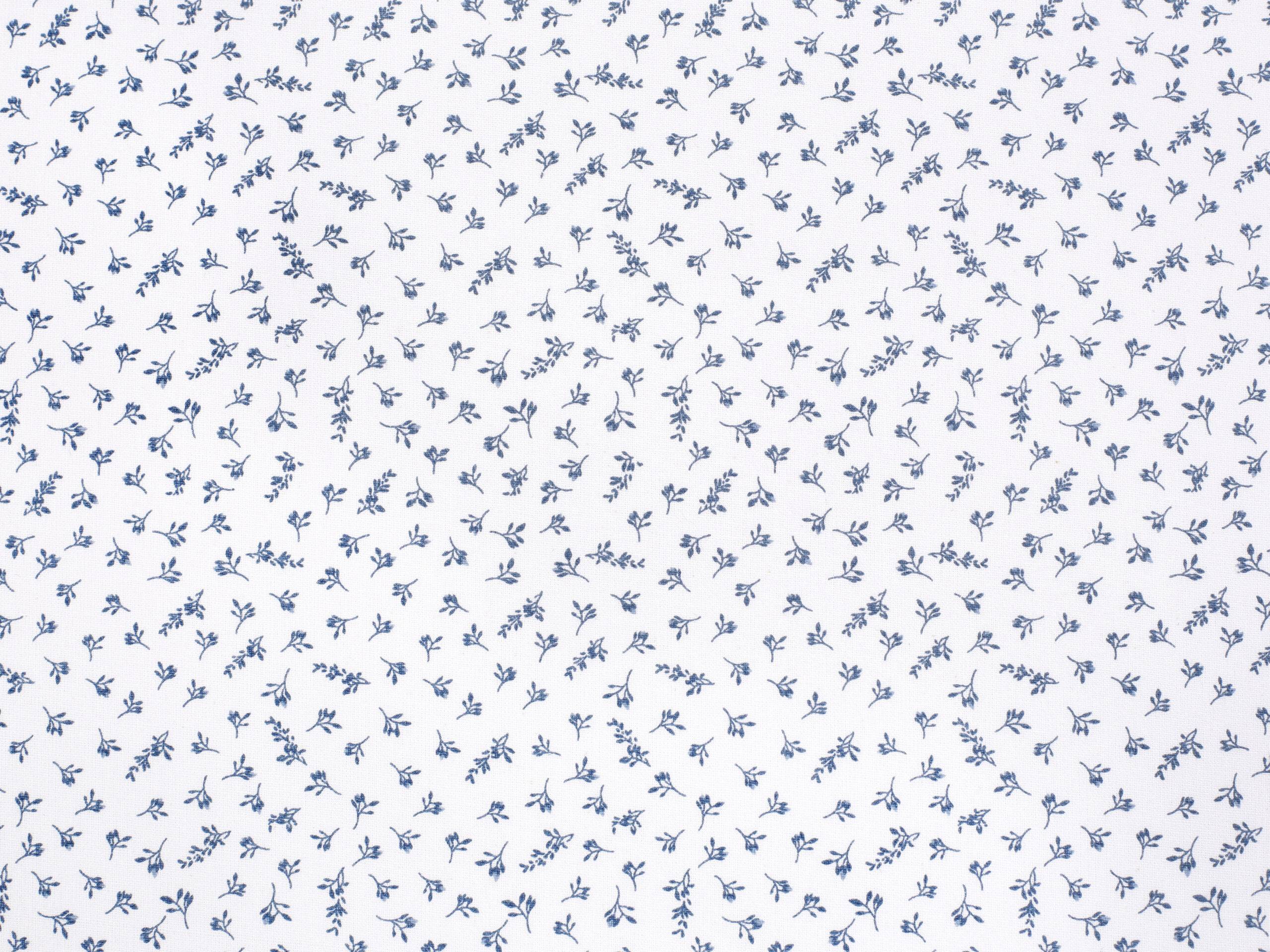 Bavlněná látka modré kvítí na bílém metráž značky Škodák.