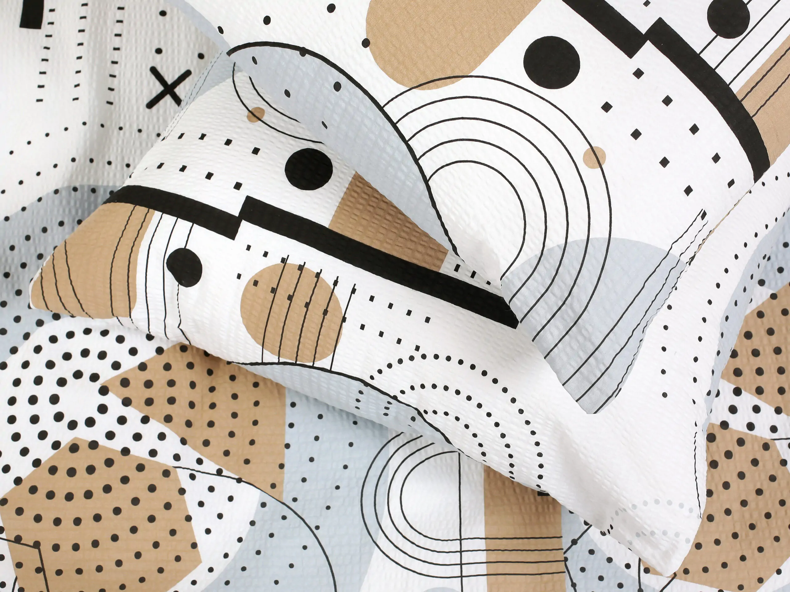 Krepové povlečení X v šedém kruhu značky Škodák