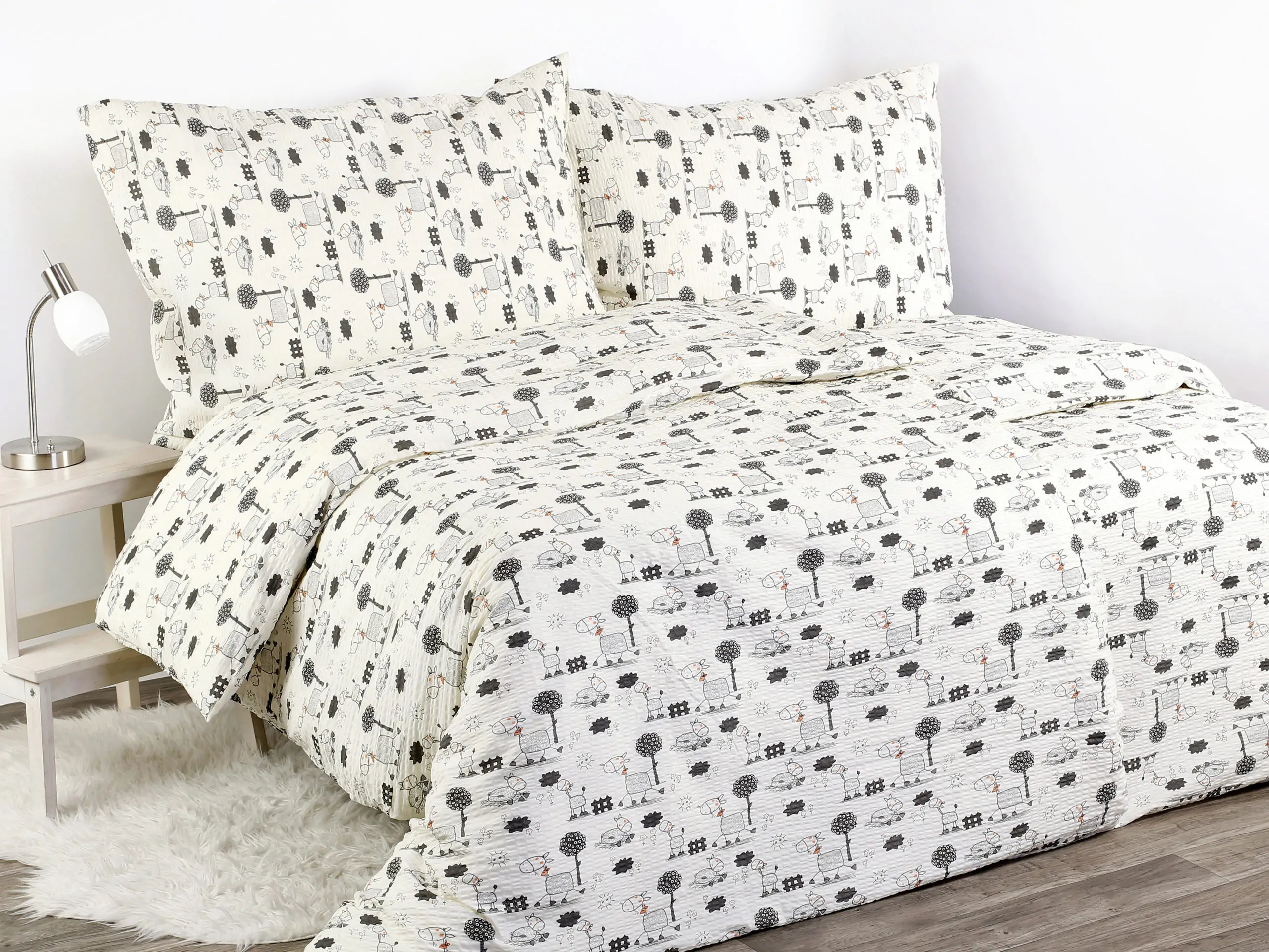 Krepové povlečení šedí oslíci značky Škodák