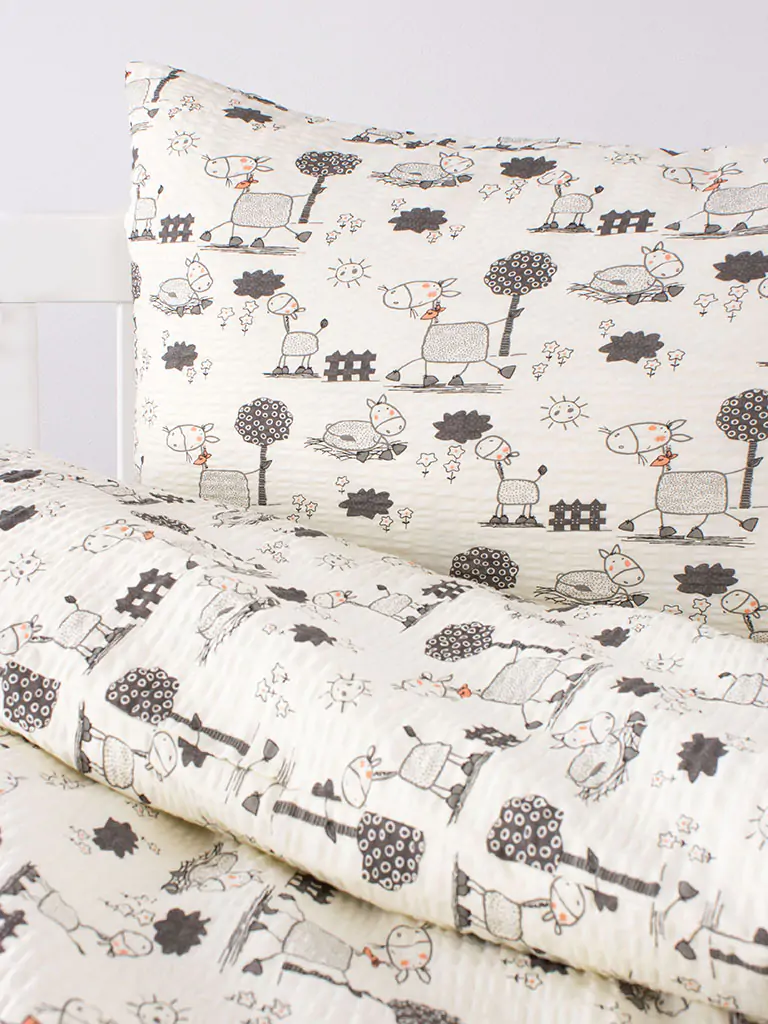 Krepové povlečení šedí oslíci značky Škodák