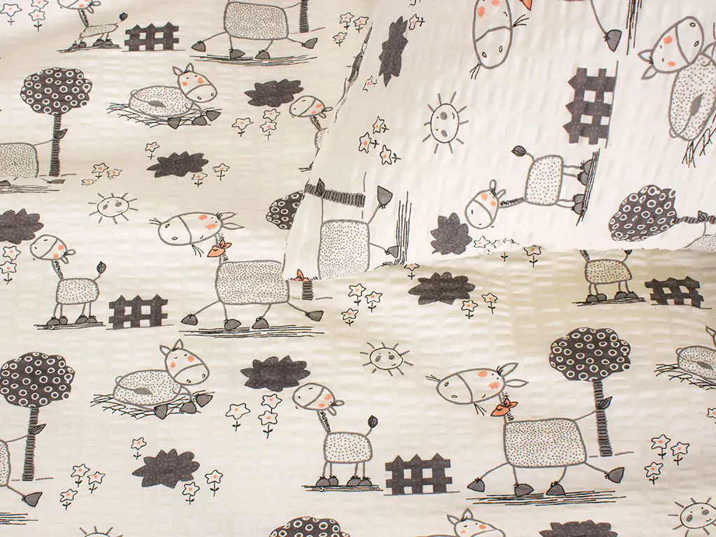 Krepové povlečení šedí oslíci značky Škodák